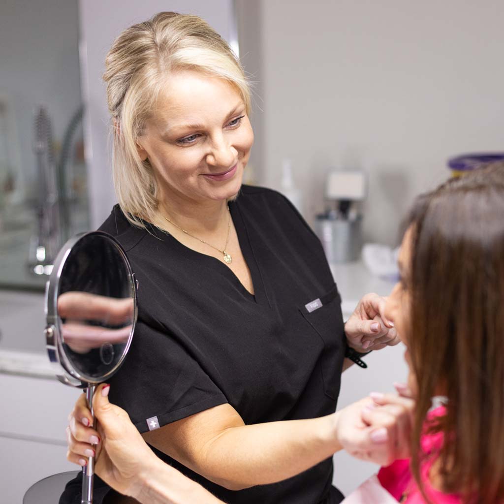 Beyoo Skin therapist in Lancaster with patient treating facial veins