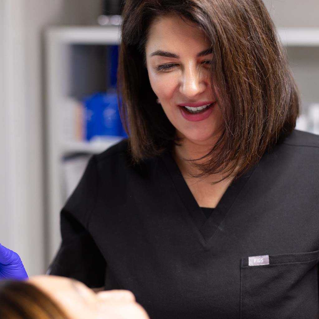 Beyoo nurse with patient for acne scar treatment in Lancaster
